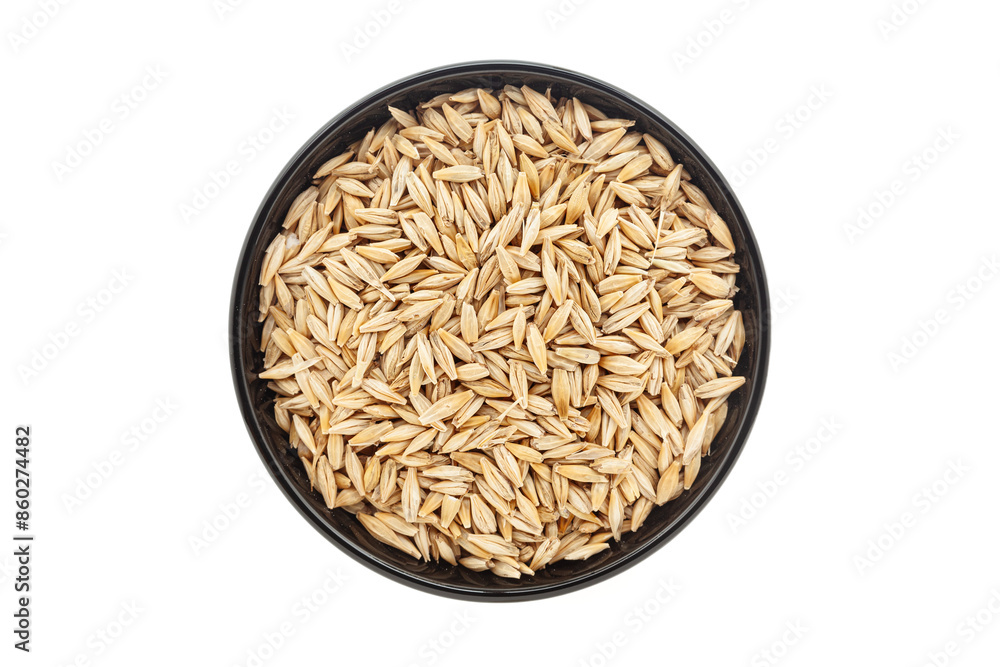 Organic Barley (Hordeum Vulgare) or jau grains, in a black ceramic bowl. Isolated on a white background. Top View Organic Barley (Hordeum Vulgare) or jau grains, in a black ceramic bowl. Isolated on a white background. Top View