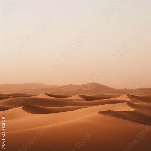 A serene desert landscape with rolling sand dunes under a warm, hazy sky, capturing the tranquility and beauty of the natural environment.