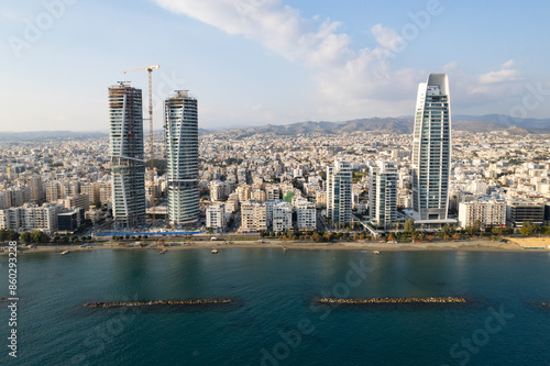 Drone aerial view of waterfront of modern coastal city. Limassol town Cyprus Europe photo