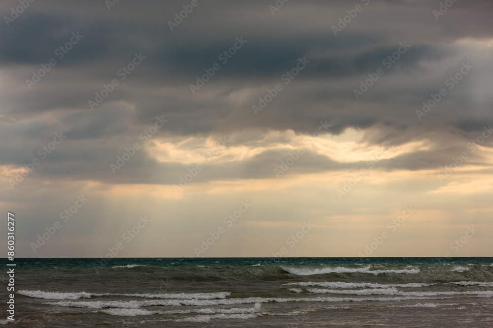 Heavy storm clouds moving in over Lake Michigan in mid-October at Harrington Beach State Park, Belgium, Wisconsin Heavy storm clouds moving in over Lake Michigan in mid-October at Harrington Beach State Park, Belgium, Wisconsin
