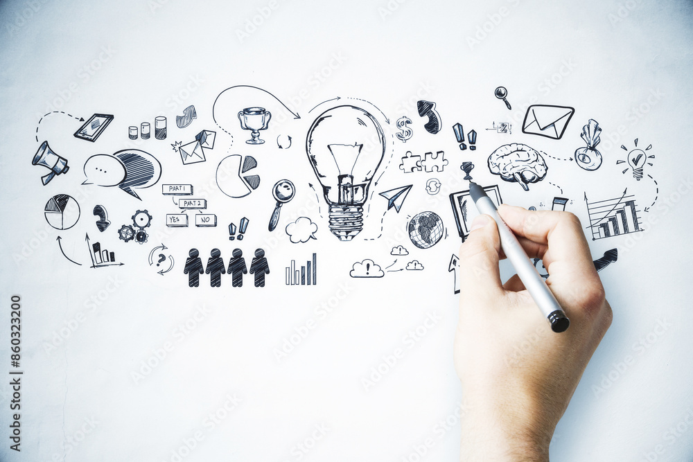 Hand drawing a variety of doodles related to business concepts on a white background, showcasing creativity and ideas Hand drawing a variety of doodles related to business concepts on a white background, showcasing creativity and ideas