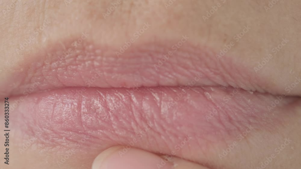 close up lips mature female face, woman 50 years old carefully examines wrinkles around mouth, skin defects, facial hair, age-related changes, aesthetic cosmetology, anti-aging procedures close up lips mature female face, woman 50 years old carefully examines wrinkles around mouth, skin defects, facial hair, age-related changes, aesthetic cosmetology, anti-aging procedures