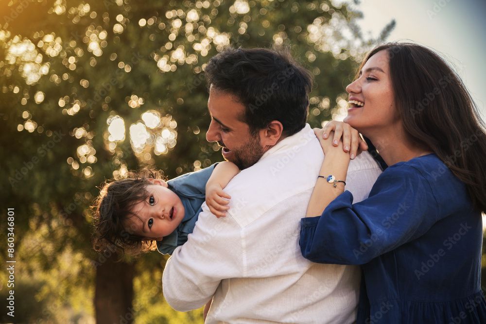 Fototapeta premium Happy Family Embracing in Nature