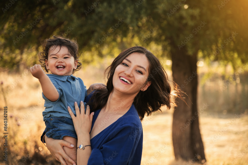 Mother and Son Enjoying a Sunny Day in Nature Mother and Son Enjoying a Sunny Day in Nature