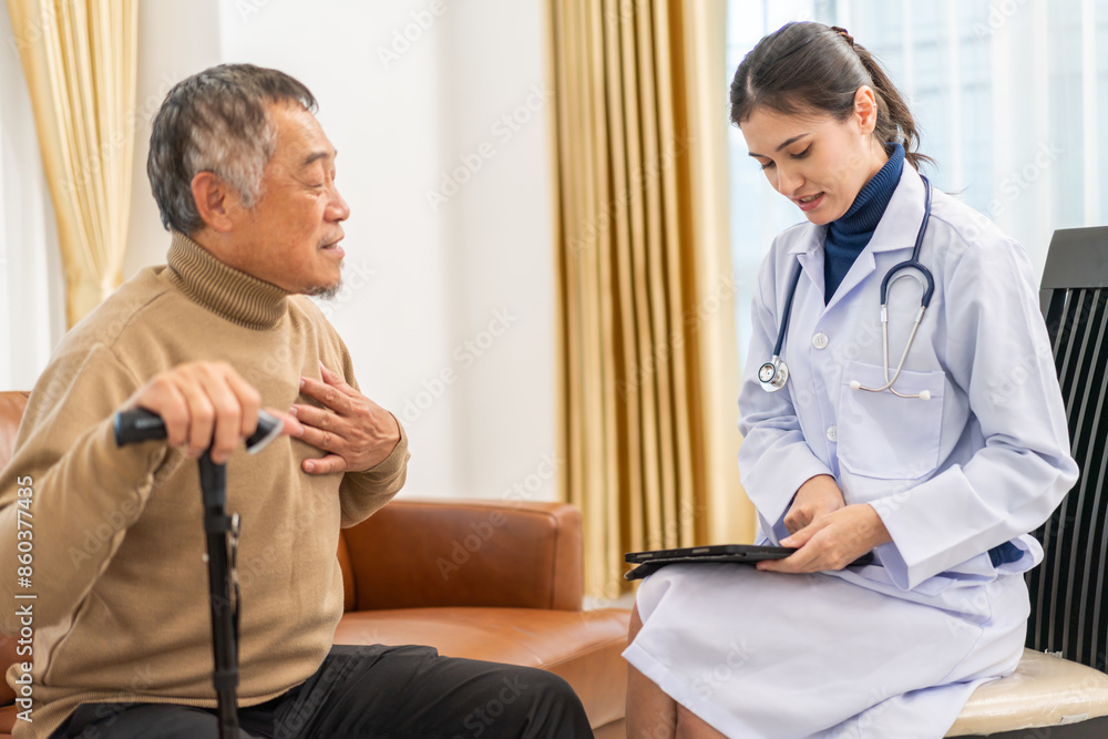 Obraz premium Portrait of smiling caring asian doctor service help support discussing and consulting taking care, caring, caregiver with senior elderly asian man at home visit.senior retirement home care