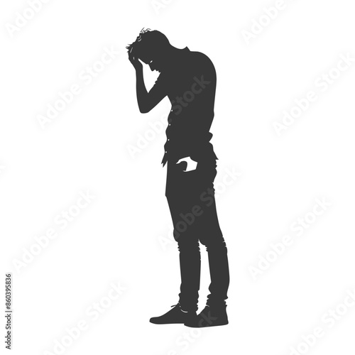 Silhouette of a Distressed Young Man: Hand to Head, Downcast, Isolated.
