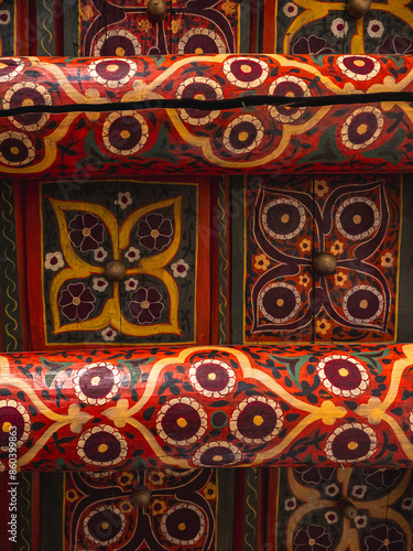 Details of Tach Khaouli ceiling, wooden painted, colorful, ornaments in Khiva, Uzbekist photo