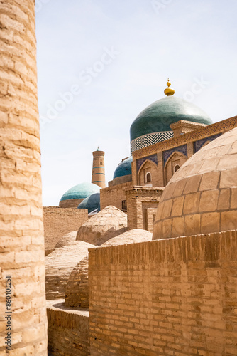 Green dome of Pahlavan Mahmud Mausoleum in the ancient city of Khiva, Uzbekistan photo