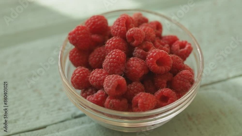 raspberries in a glass bowl