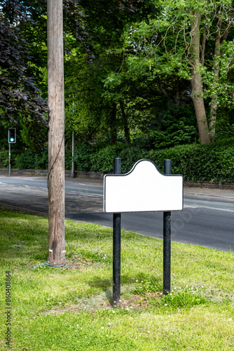 Blank city or town sign on the side of the road