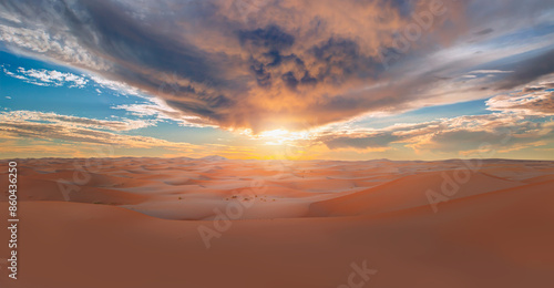 Fototapeta Naklejka Na Ścianę i Meble -  Beautiful sand dunes in the Sahara desert with amazing cloudy sky - Sahara, Morocco