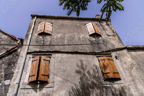 Obraz na płótnie Strolling through the streets of the decaying village of Zirje on the island of the same name in Croatia w salonie