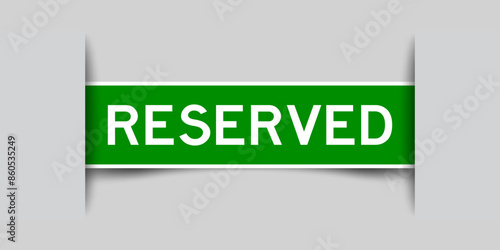 Green color square label sticker with word reserved that inserted in gray background