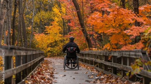 Inclusive Autumn Bike Ride: Wheelchair Accessible Trail Surrounded by Vibrant Fall Foliage