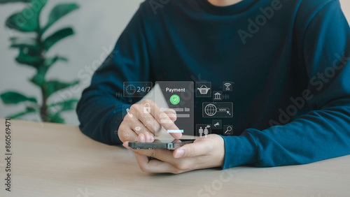 Obraz na płótnie Buy now pay later online shopping concept. Hands holding mobile phone on blurred store as background. Online shopping. Paying after delivery. Complete the payment after purchase at no added cost. w salonie