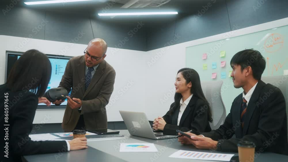 Happy diverse group Asian business team analyzing statistics financial. Group Team of business people meeting conference discussion various topic corporate concept in office. Happy diverse group Asian business team analyzing statistics financial. Group Team of business people meeting conference discussion various topic corporate concept in office.