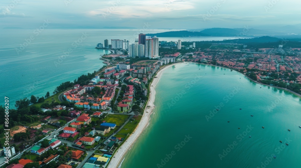 Panoramic aerial shot of a beachfront city featuring colorful buildings, sandy shores, and clear turquoise waters, set against a backdrop of distant mountains. Panoramic aerial shot of a beachfront city featuring colorful buildings, sandy shores, and clear turquoise waters, set against a backdrop of distant mountains.