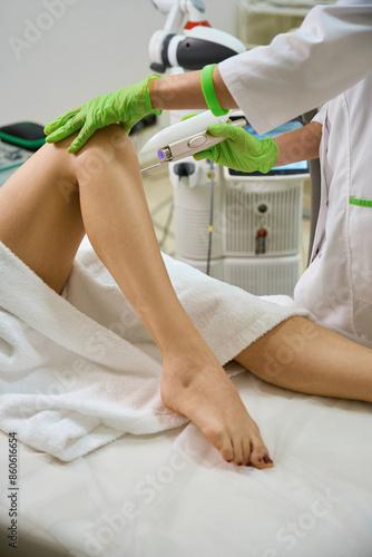 Obraz na płótnie Doctor performs a vaginal wall rejuvenation procedure on a patient w salonie