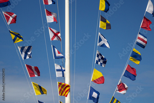 Nautical flags fluttering in the wind.