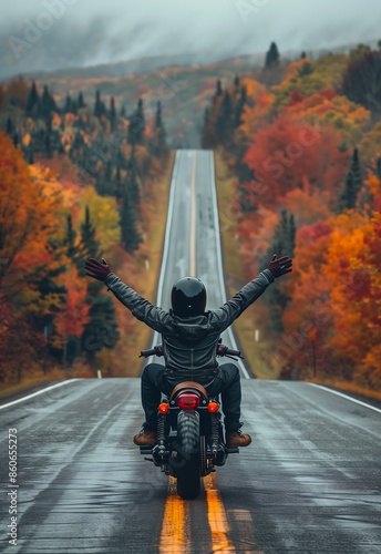 man motorcycle arms outstretched road foliage clothing perspective giving middle finger view high red wings pure joy visualize motivation fall season profile