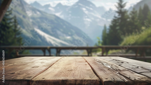 Holztisch als Hintergrund. Alpen Berge photo
