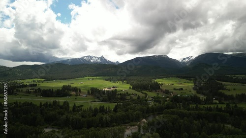 Aerial of Bitterroot mountains near Missoula Montana in summer with dramatic sky photo