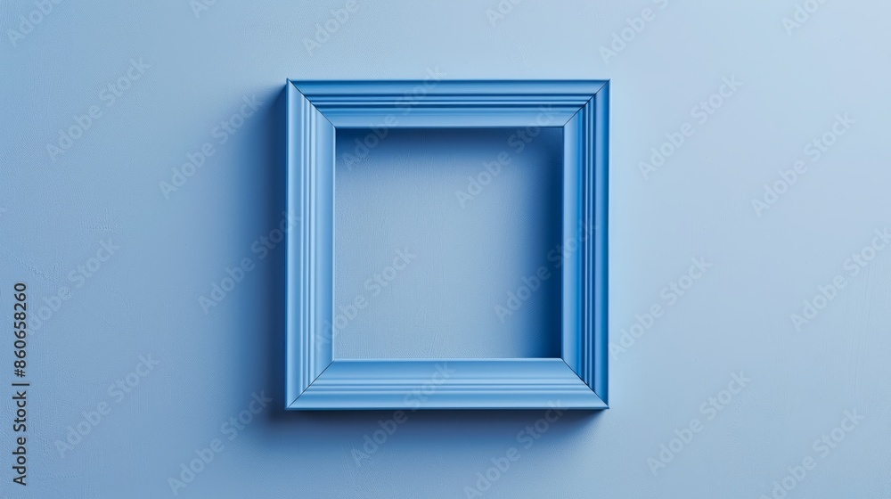 Blue picture frame on a wall Blue picture frame on a wall