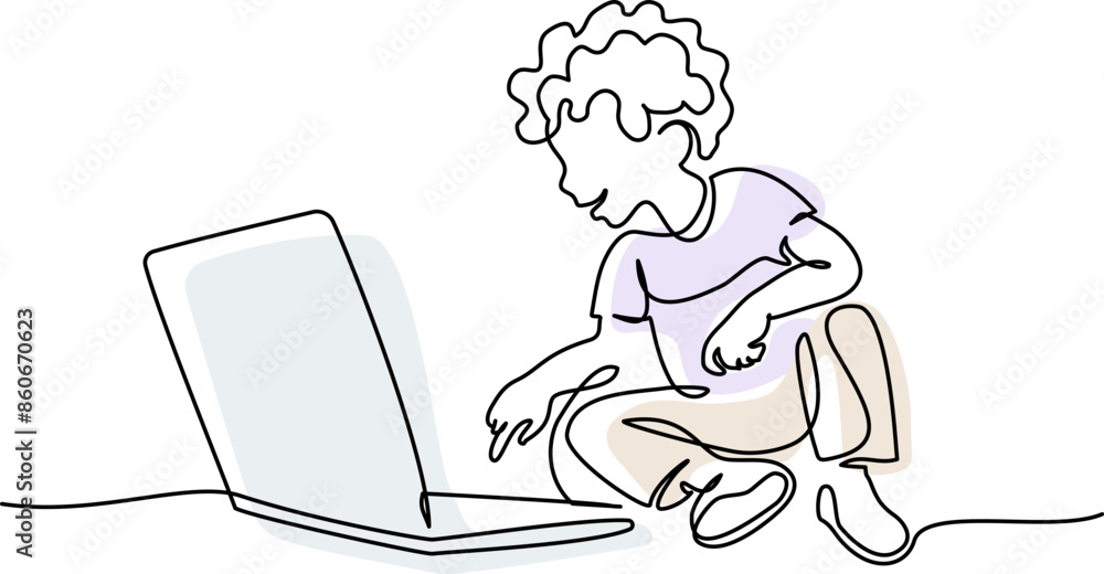 Boy sitting on floor and watching laptop computer. Education concept. Boy sitting on floor and watching laptop computer. Education concept.