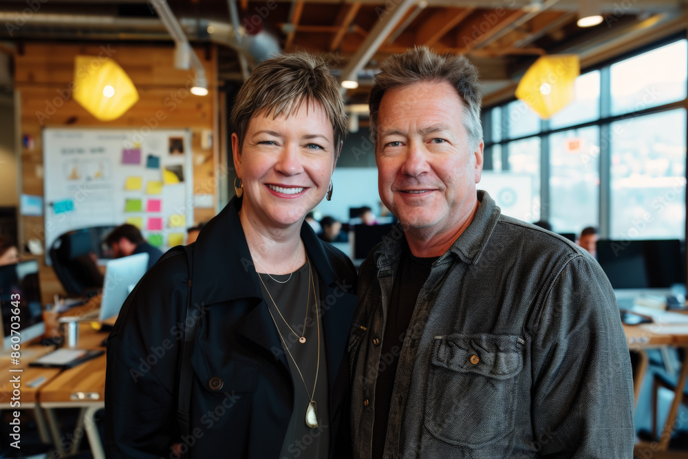 Portrait of a middle-aged couple who co-founded a successful tech startup Portrait of a middle-aged couple who co-founded a successful tech startup