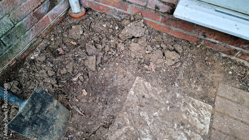 Wallpaper Mural Close up of muddy ground works and a drain pipe Torontodigital.ca