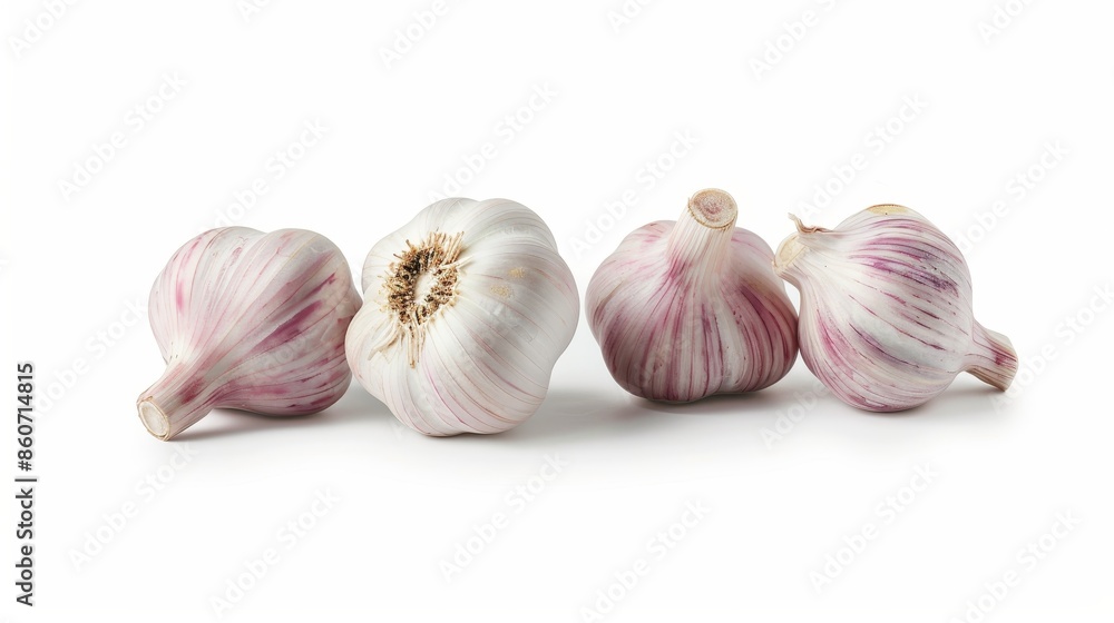 Whole and cut ripe garlic isolated on white wallpaper background Whole and cut ripe garlic isolated on white wallpaper background
