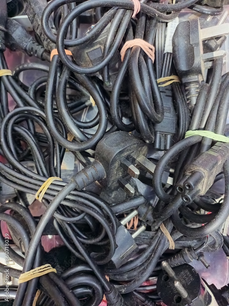 Background of a bunch of laptop power cords Background of a bunch of laptop power cords