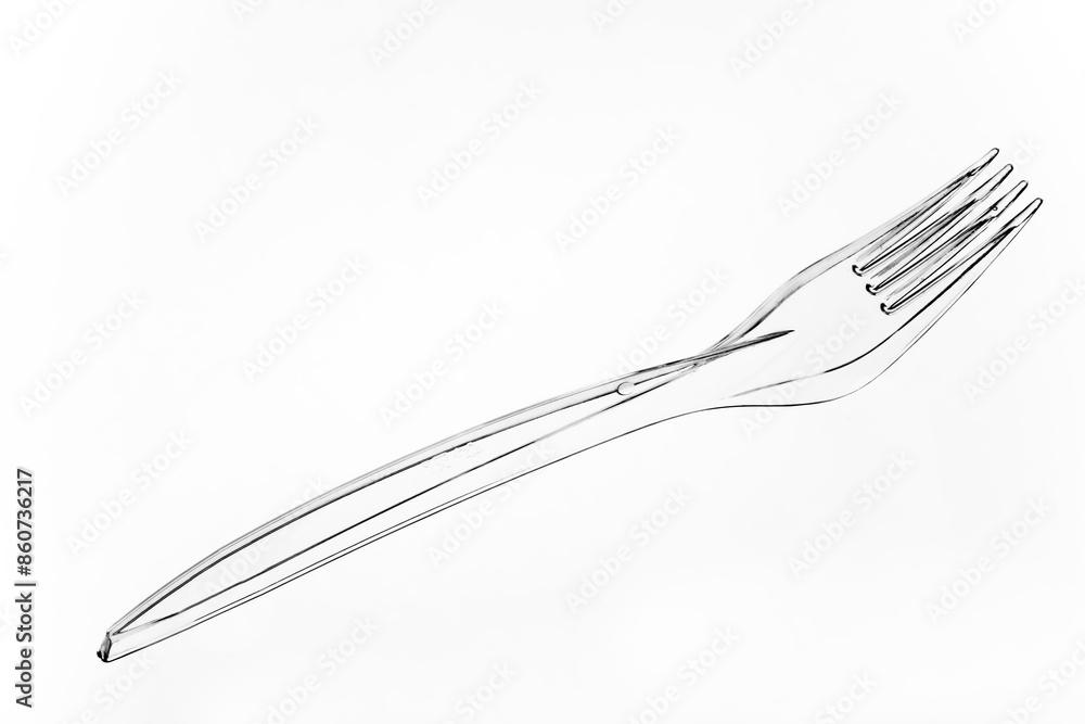 Disposable plastic fork. Disposable cutlery. Plastic dishes. Disposable plastic fork. Disposable cutlery. Plastic dishes.