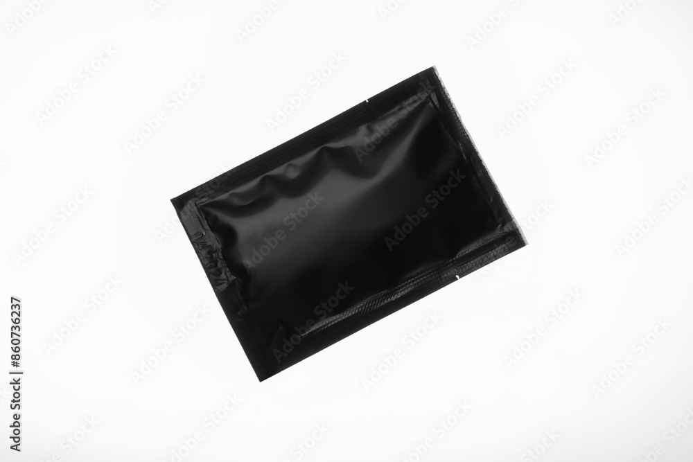 A packet of sugar or salt. Disposable stick. A packet of sugar or salt. Disposable stick.