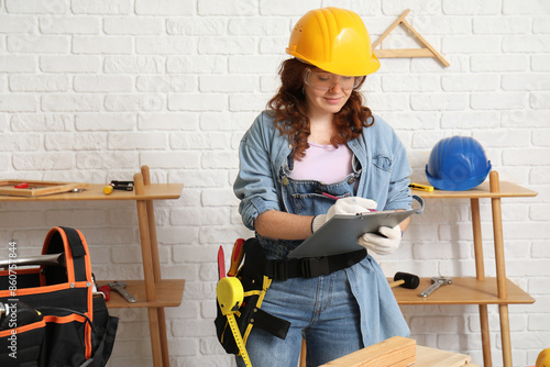 Female carpenter with tools...