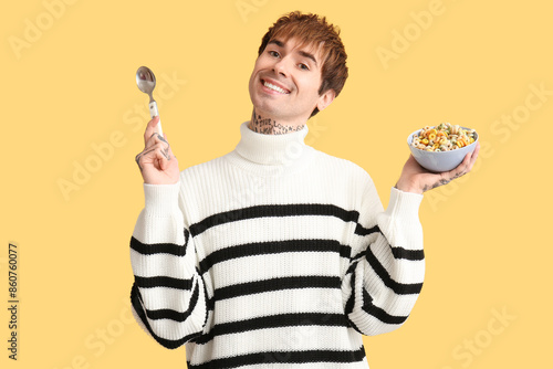 Man holding bowl with cerea...