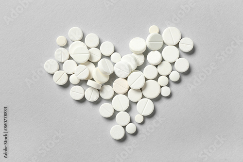 Heart made of white pills o...