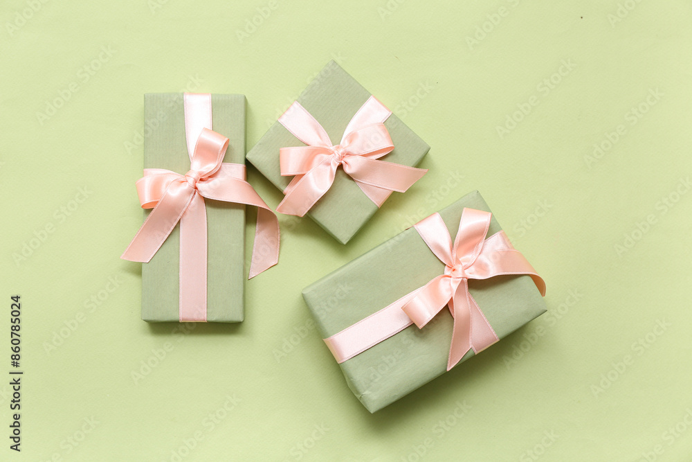 Gift boxes on green background. International Women's Day Gift boxes on green background. International Women's Day