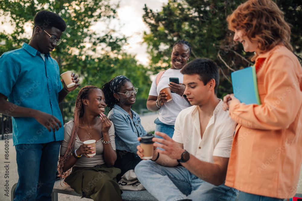 Interracial college students on coffee break at university campus talking Interracial college students on coffee break at university campus talking