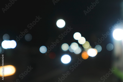 Beautiful blurry bokeh with balloon lights and motorcycle lights