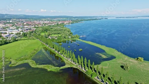 Aerial view of the Radolfzell Aachried at high tide with the Mooser Damm, which connects the town and surrounding area of Radolfzell with the Hoeri peninsula. On the horizon to the left is the photo