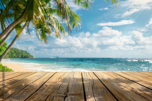 Beautiful tropical beach with wooden table top, summer background © Ikhou