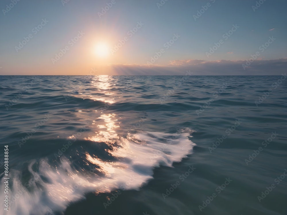 A clear blue ocean that stretches infinitely with a sky the color of a beautiful afternoon with the setting sun reflecting off the water. A clear blue ocean that stretches infinitely with a sky the color of a beautiful afternoon with the setting sun reflecting off the water.