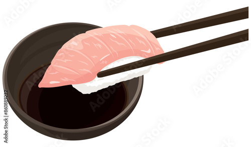 大トロ寿司を醤油につける