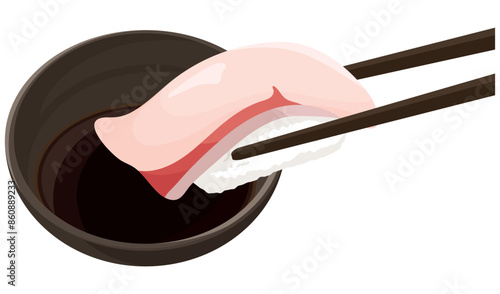 はまちの寿司を醤油につける