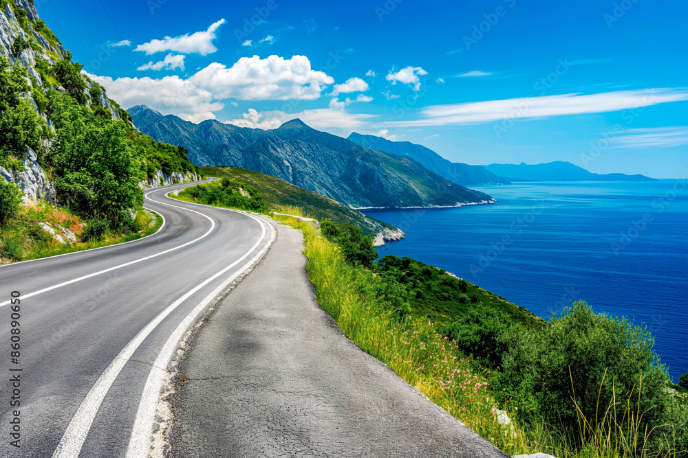 Turning mountain highway with blue sky and sea on a background Turning mountain highway with blue sky and sea on a background