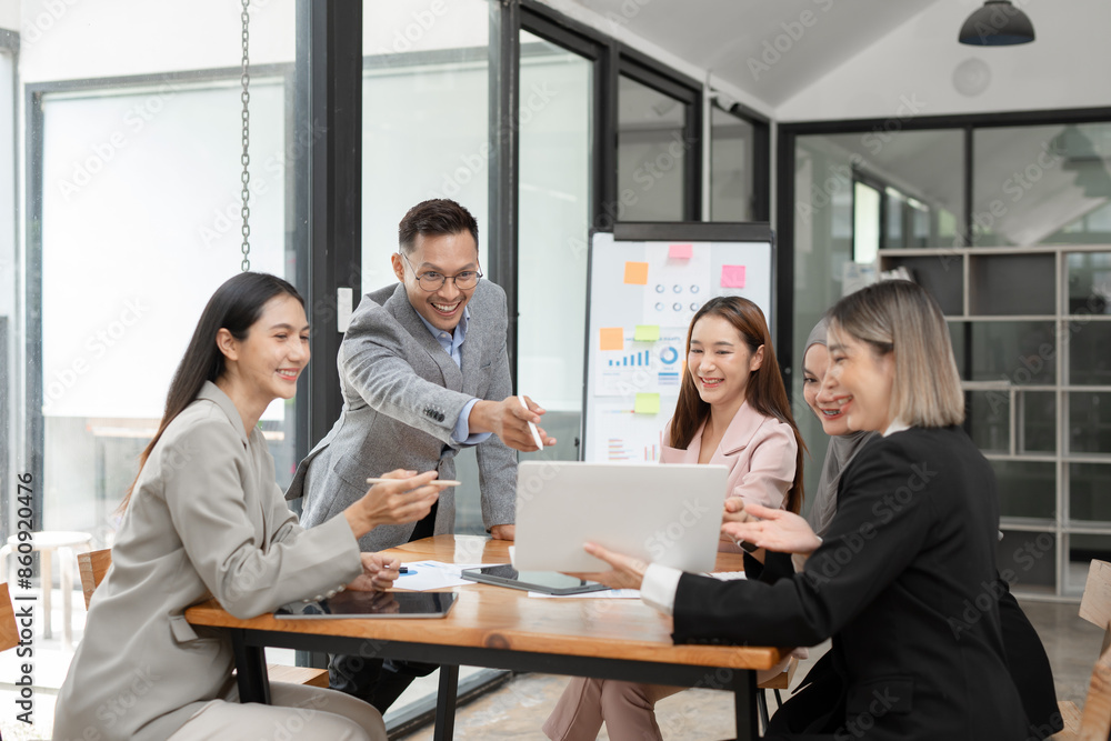 Asian Business Group Chat about graph work Present in meetings, in the office Asian Business Group Chat about graph work Present in meetings, in the office