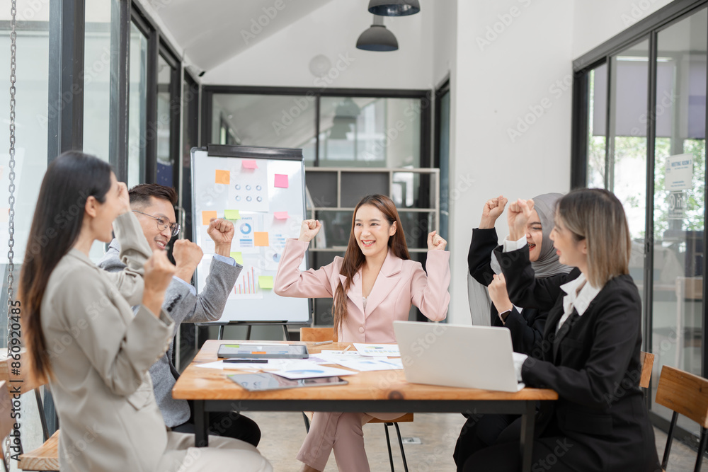 Asian Business Group Chat about graph work Present in meetings, in the office Asian Business Group Chat about graph work Present in meetings, in the office