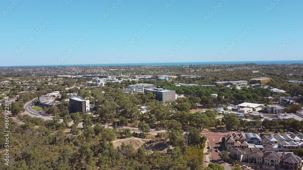 City of Joondalup aerial view over Lakeside Drive with ocean background City of Joondalup aerial view over Lakeside Drive with ocean background