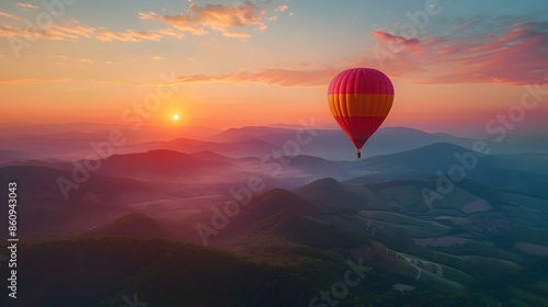 Serene Hot Air Balloon Ride Over Majestic Mountain Landscape at Captivating Sunrise © Thares2020
